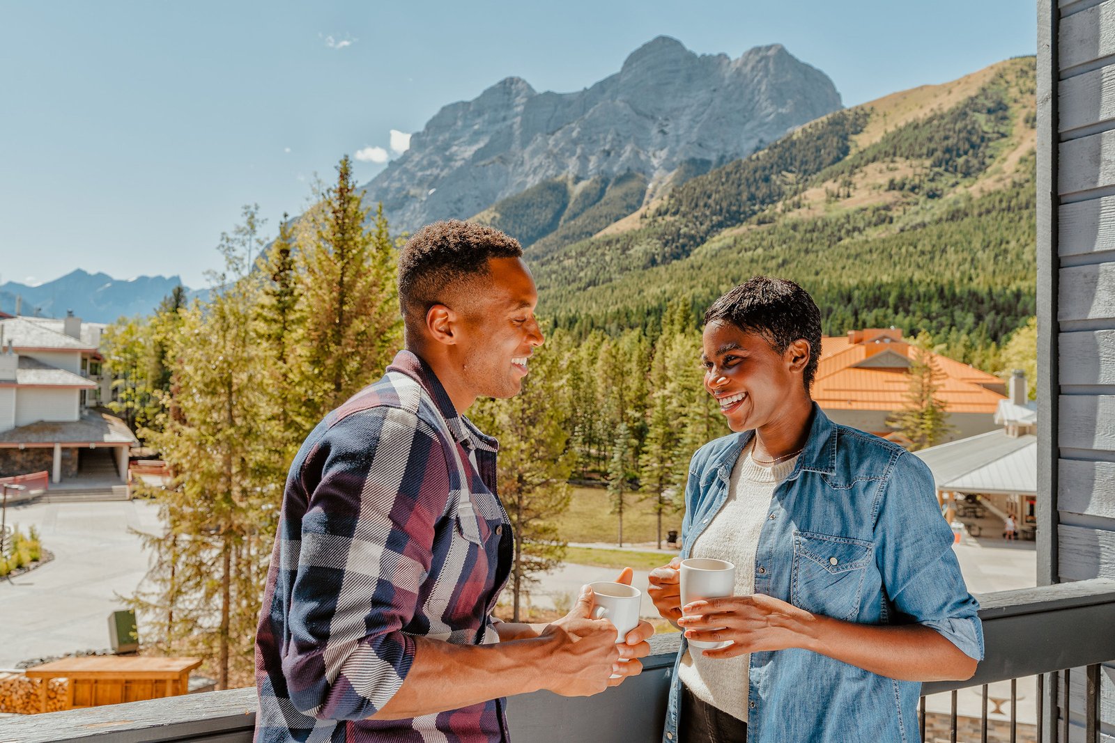 PKML Couple Balcony – Travel Alberta_Karl Lee