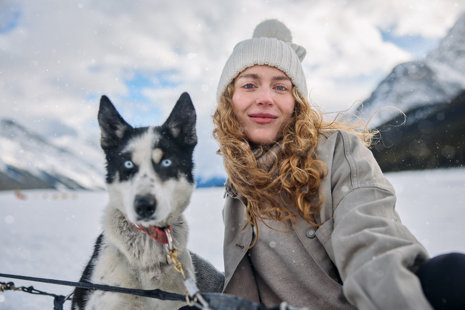 Woman and Dog Sledding – Travel Alberta C&B Advertising